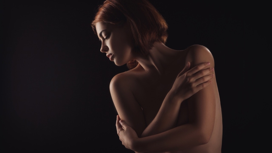 Artistic Nude Photography of a Woman Posing Gracefully